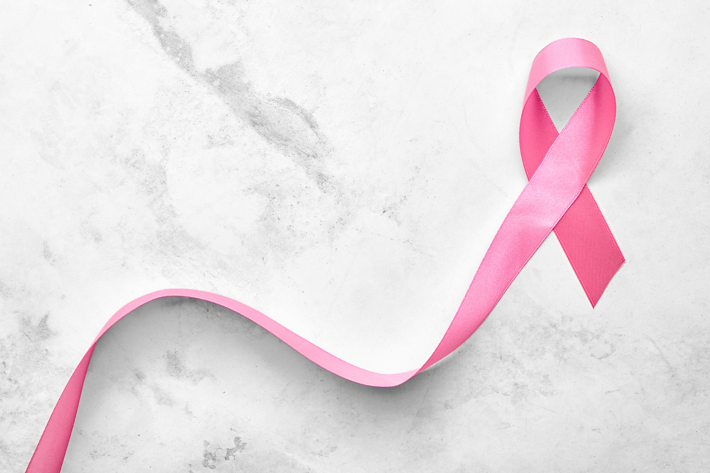 Pink Ribbon on Light Background. Breast Cancer Concept